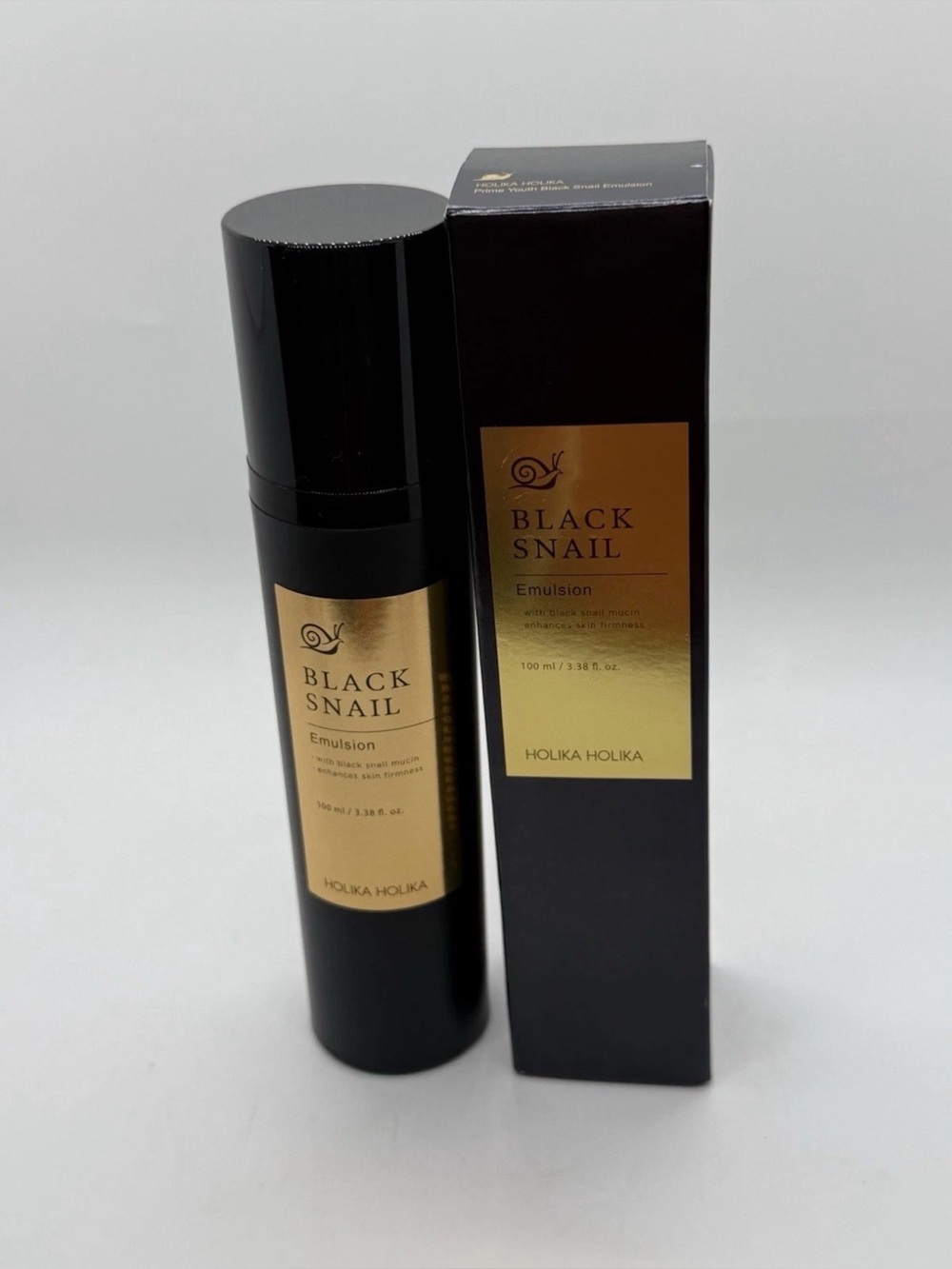 Holika Holika Black Snail Emulsion - Black & Gold